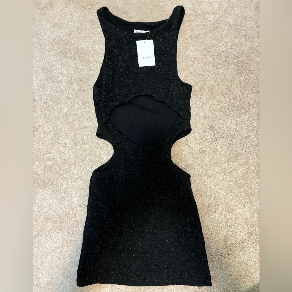 NEVER WORN TAGS STILL ON Subdued black sparkly cut out dress size xs